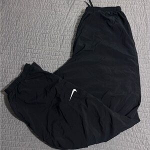 Nike Black Track Pants with White Swoosh Logo
